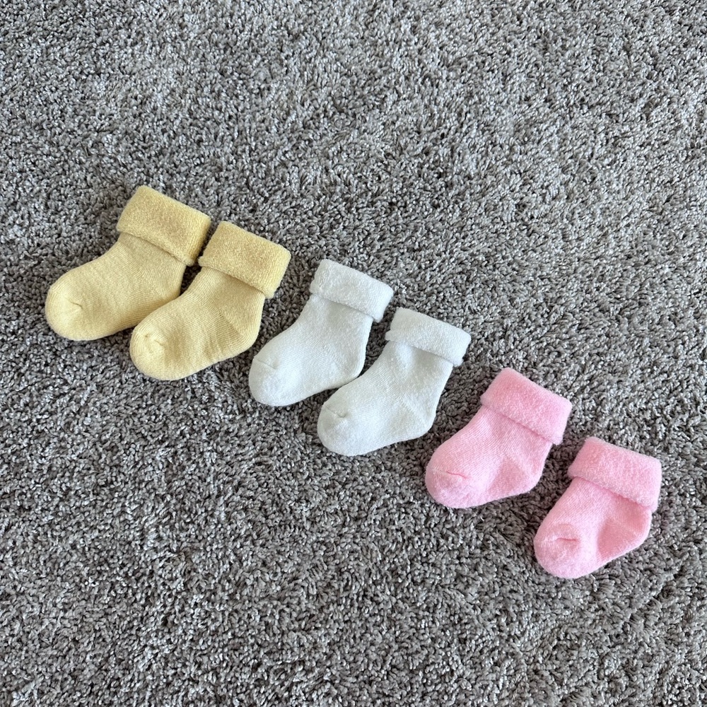 Set of Baby Socks in Yellow, White, and Pink